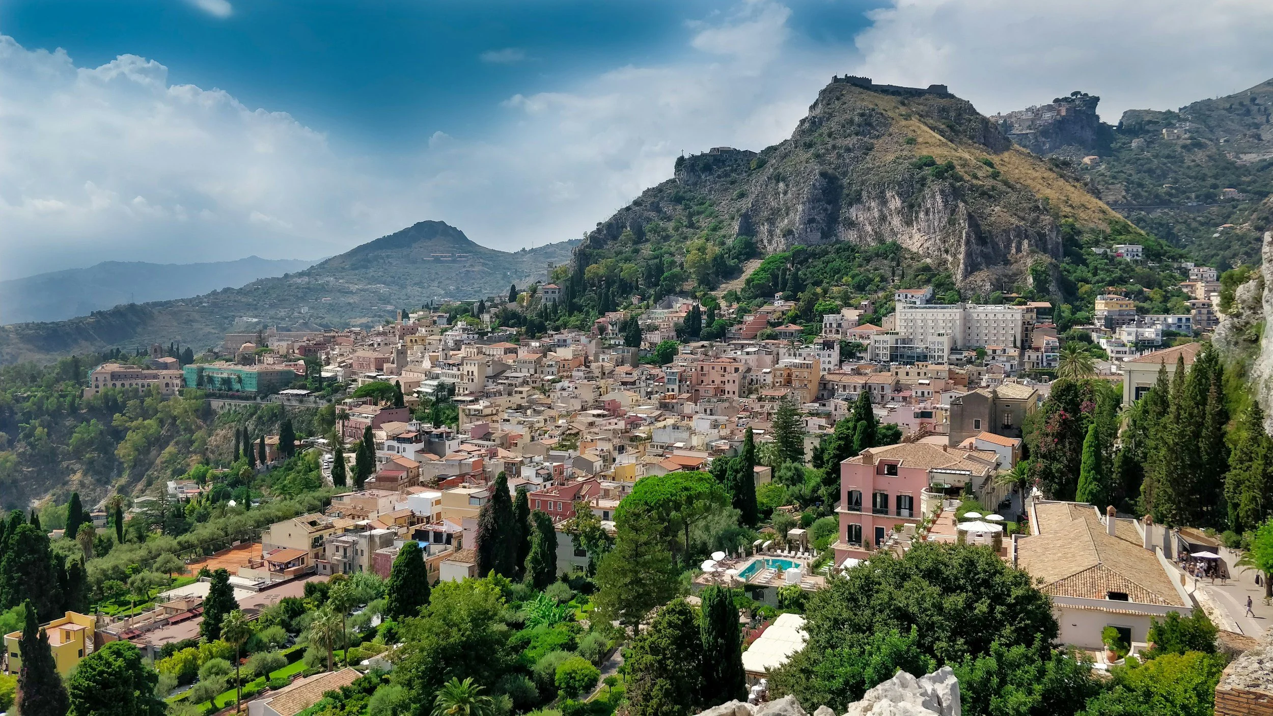 Our Favorite Destinations That Keep Us Grounded— Taormina, Italy