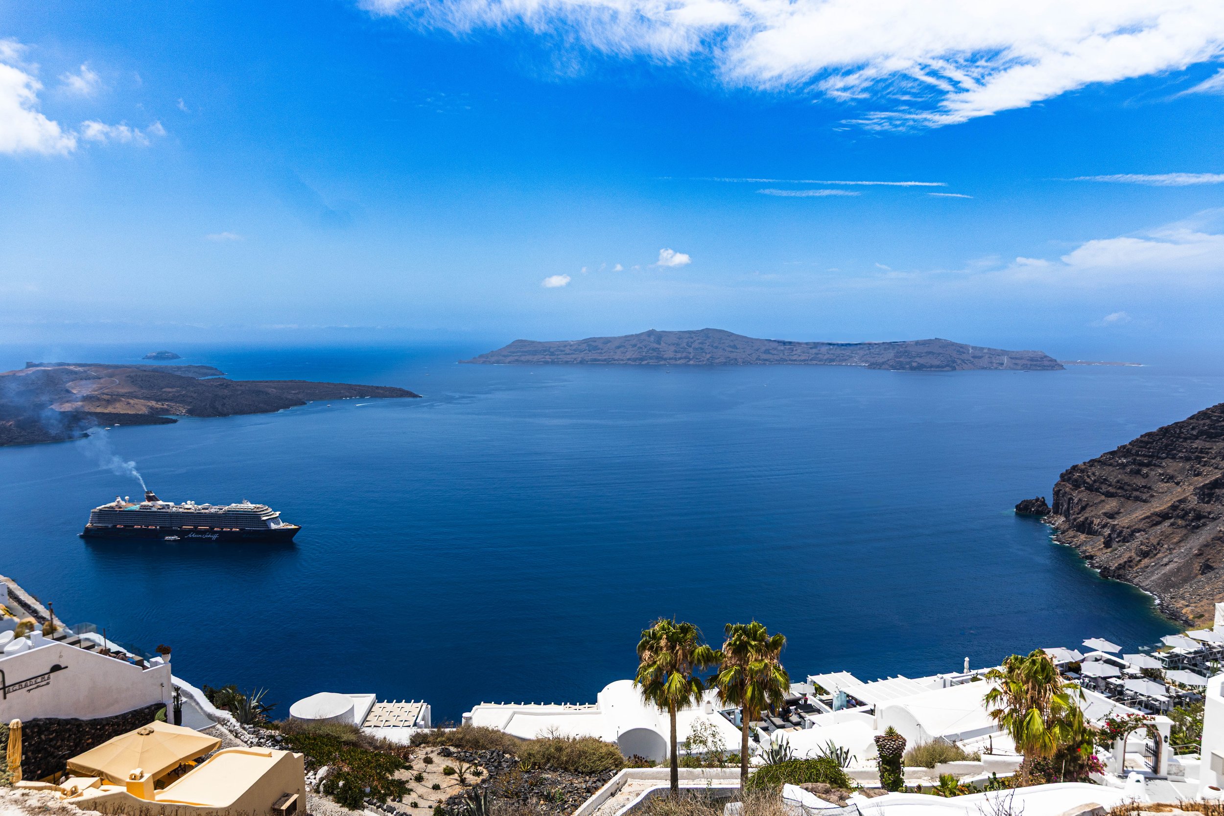 From the quiet perch of whitewashed walls and swaying palms, the sea unfurls its endless story. A moment suspended — where stillness greets wanderlust, and every ripple echoes the dreams we once whispered under sunlit skies.