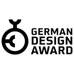 Logo for the German Design Award featuring a stylized trophy with a circular element and the text 'GERMAN DESIGN AWARD'