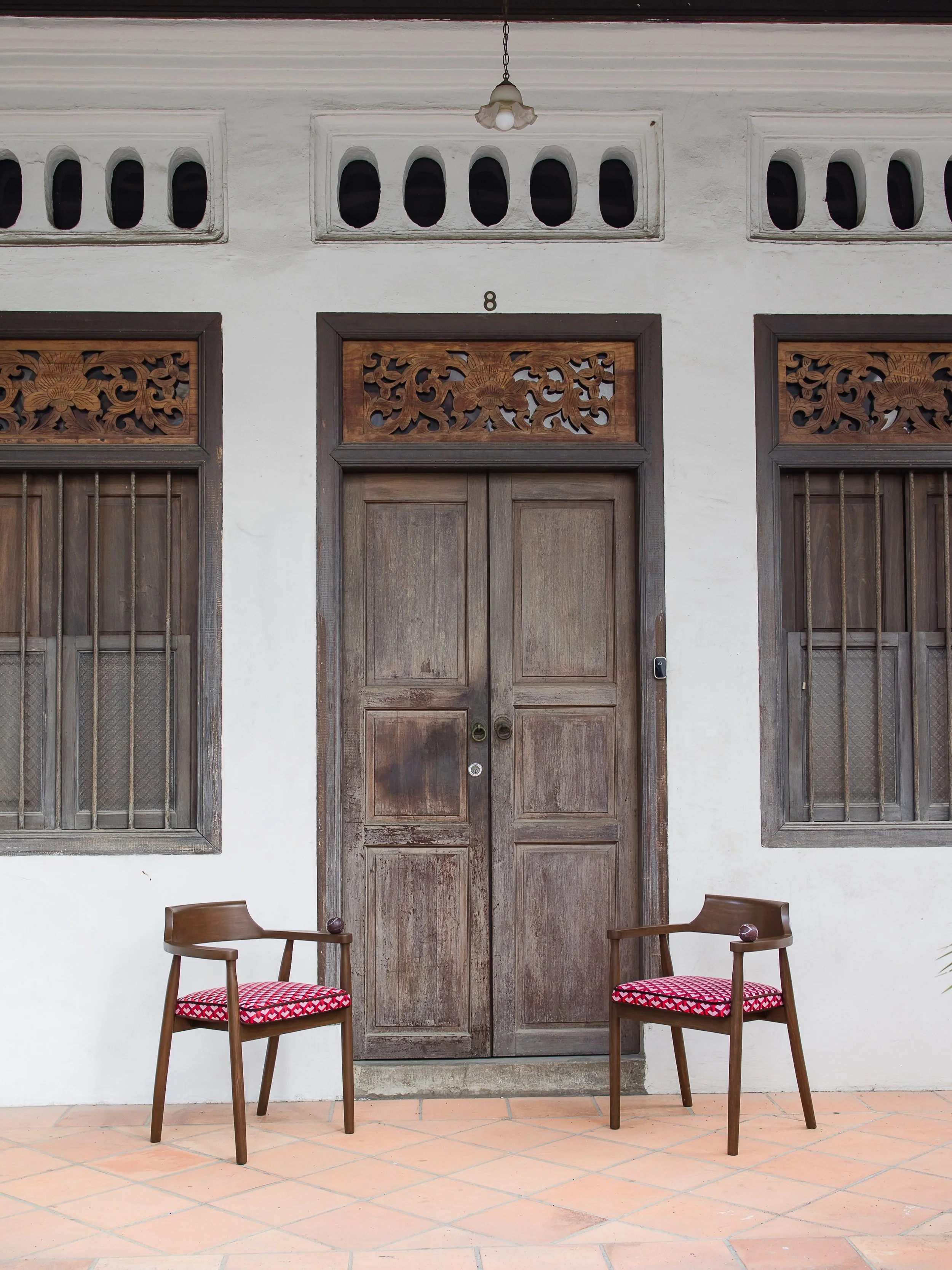 The pieces were never designed in isolation.
Every curve, marble sphere, fabric selection and proportion sits within a larger conversation around architecture, culture and how spaces emotionally hold people.

Singapore continues to shape so much of o