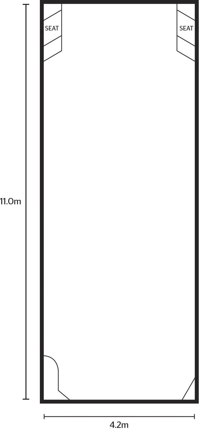 Floor plan of a room measuring 11 meters by 4.2 meters, with two built-in seats labeled 'SEAT' on opposite sides.