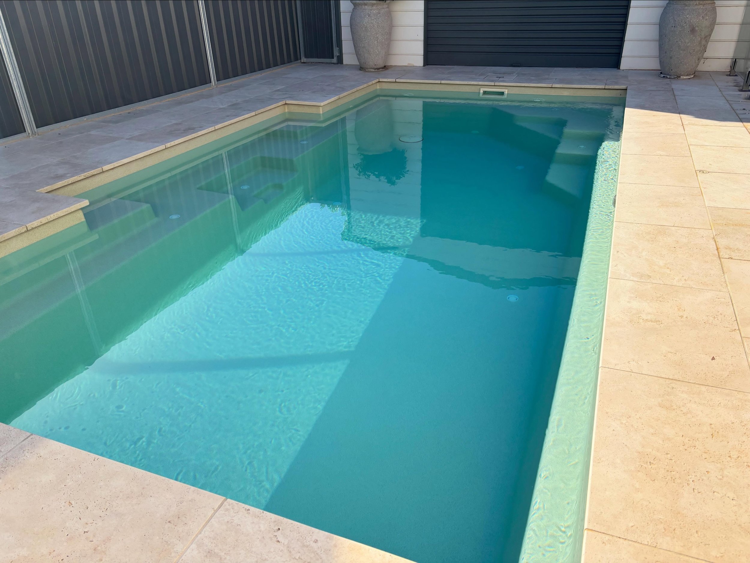 Discovery what is in-floor cleaning?

An in-floor cleaning system is an automated pool cleaning system that uses pop-up cleaning heads installed in the pool floor and steps. These heads rotate and direct pressurized water to move dirt, debris, and se