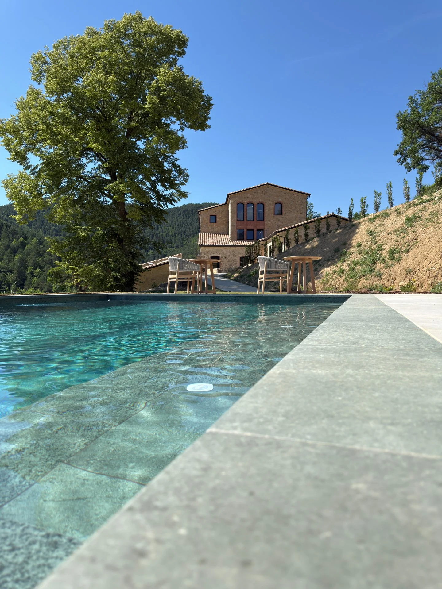 20-metre outdoor pool overlooking the mountains at Seven By Bussacs and the boutique hotel