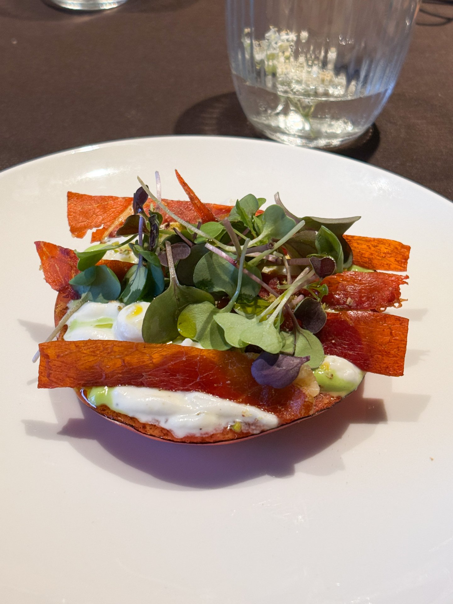 Three-course dinner table setting at Seven By Bussacs restaurant, Catalonia