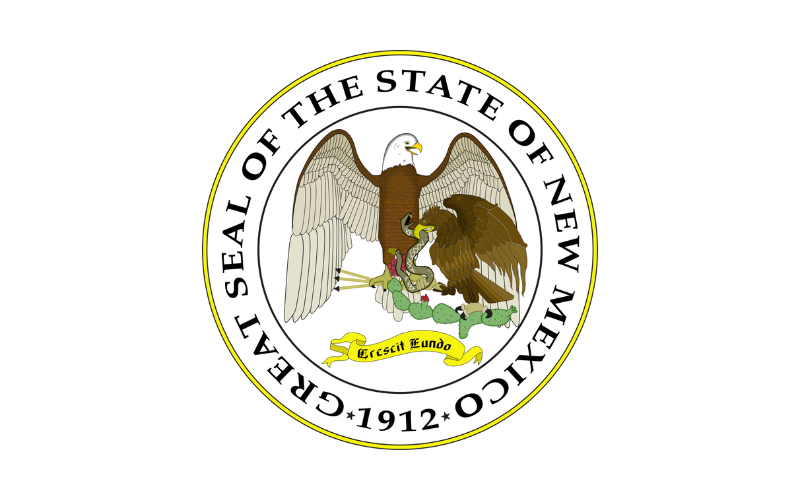 Seal of the State of New Mexico featuring an eagle, a badger, and a draped banner with the Latin phrase 'Crescit Eundo', all within a circular border.