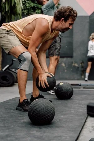 Partner drills at HYROX training camp.