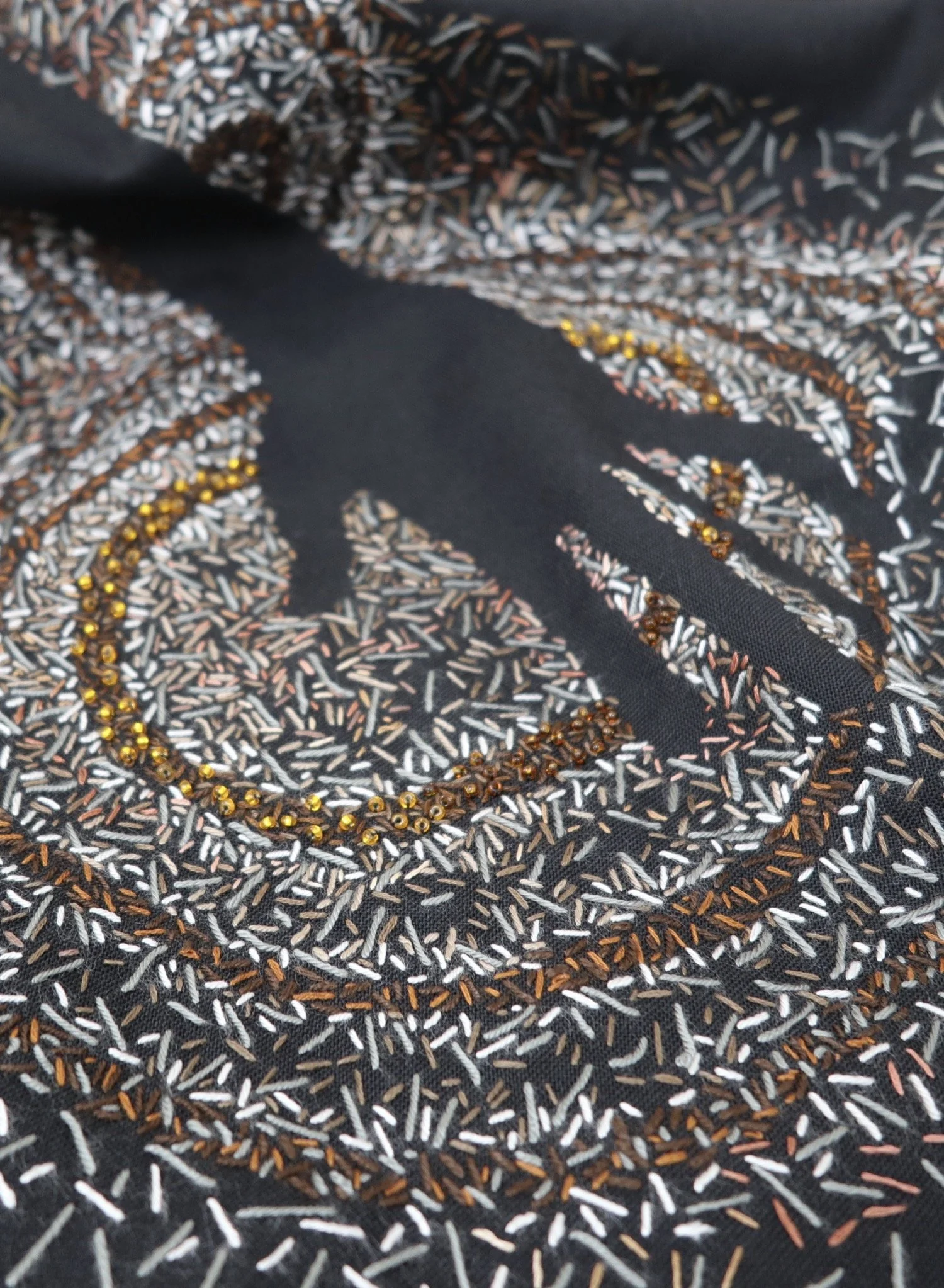 tamar Mason embroidery and detyail of hand shadow