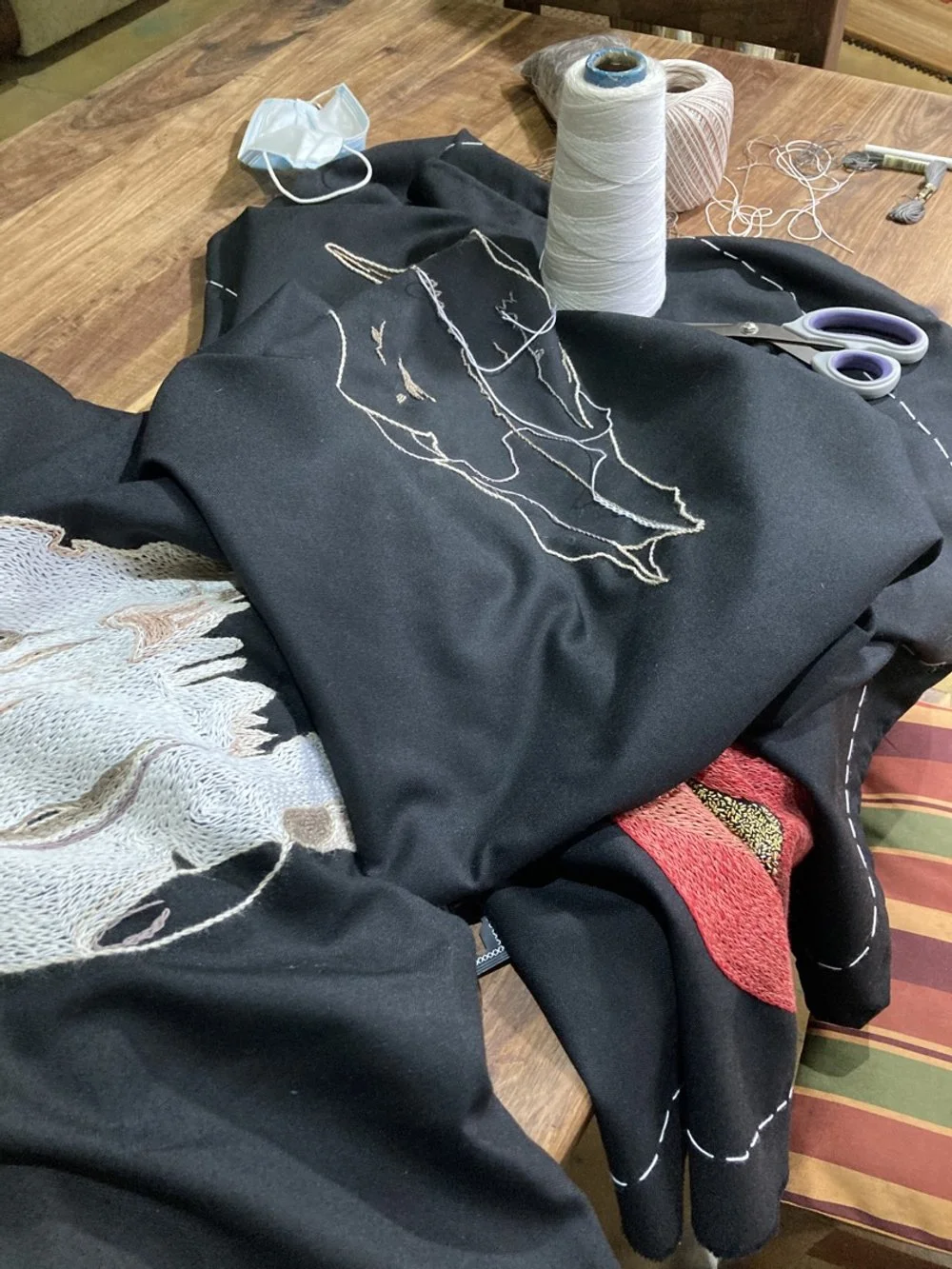 Tamar Mason working on embroidery of Elandskraal