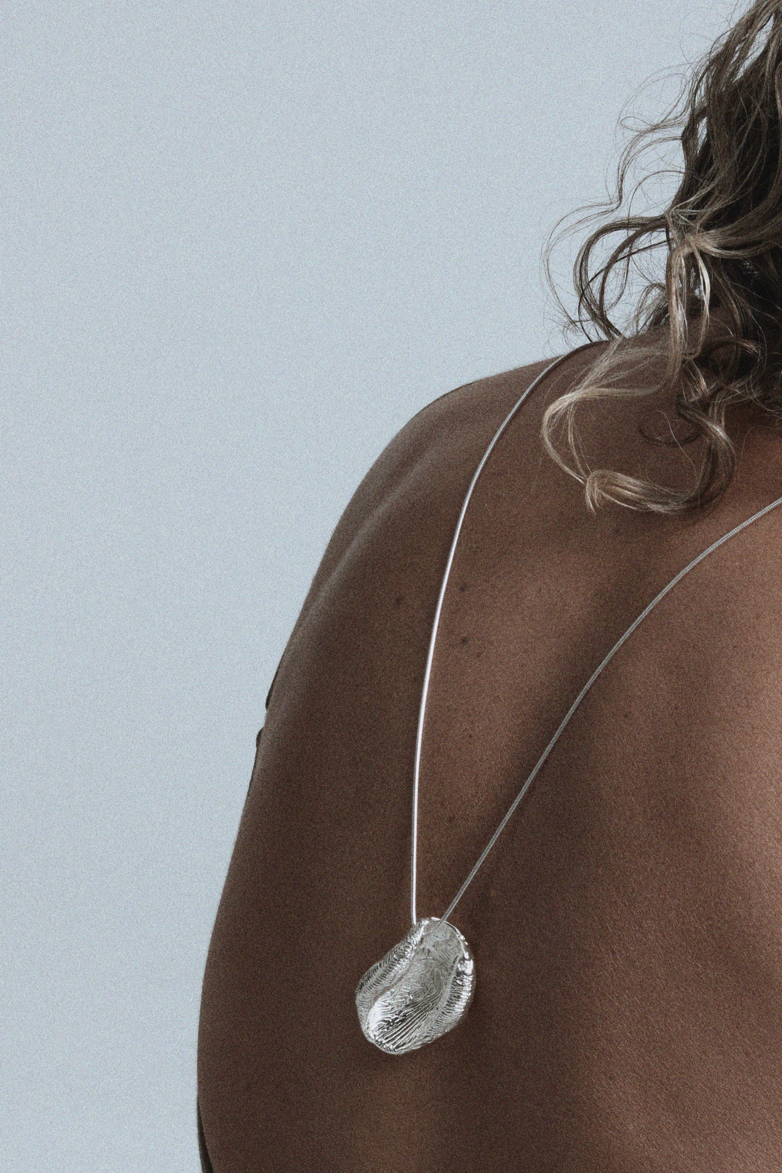 Grounding Clasp Pendant