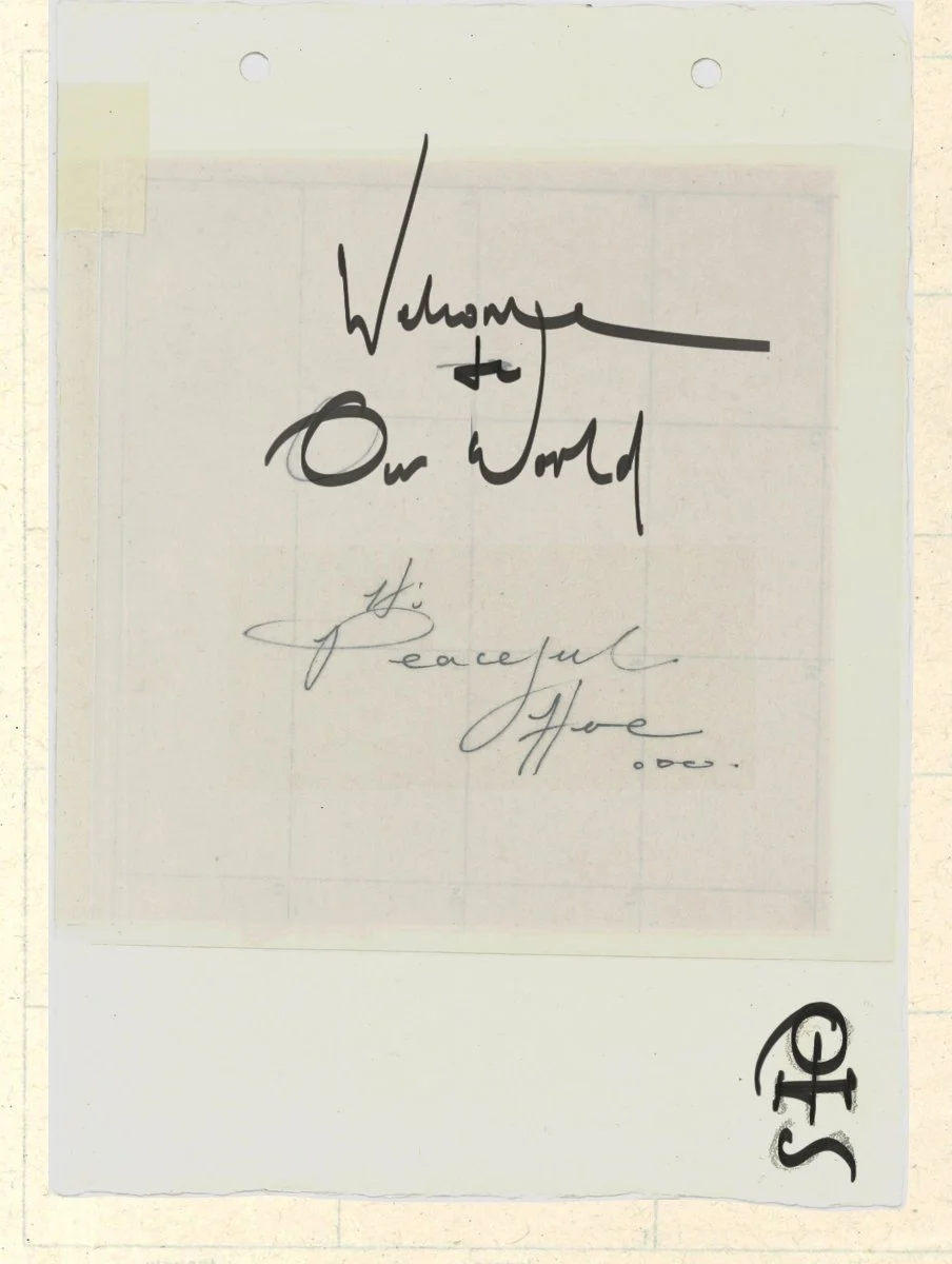 Handwritten note on paper that says 'Welcome to Our World' and is signed by Hope, with a decorative symbol at the bottom right.