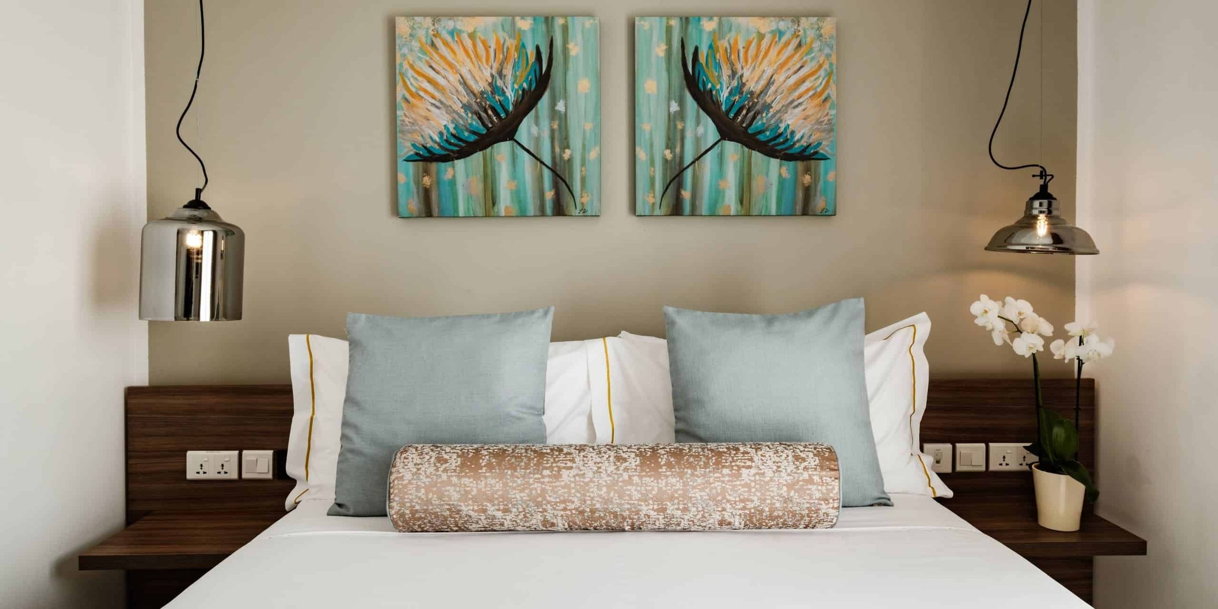 STANDARD ROOM - A comfortable and refined room featuring a private balcony and a cosy, understated atmosphere.