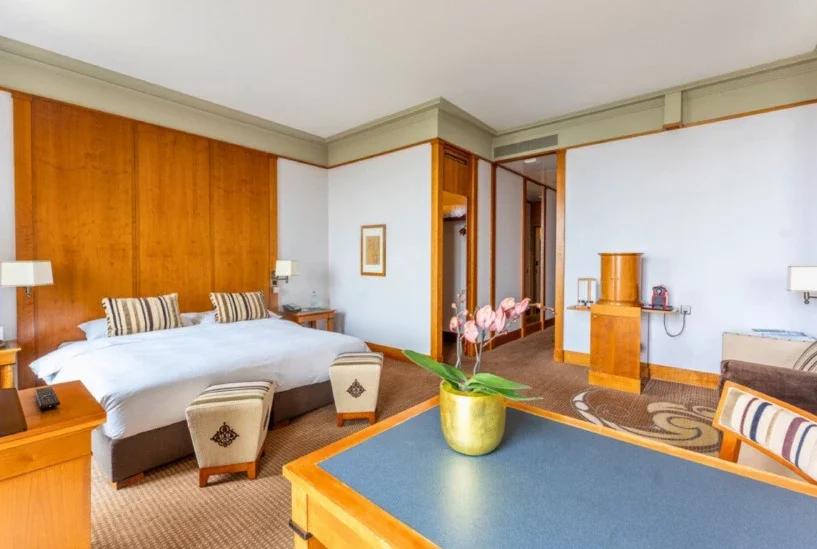 DELUXE ROOM - An elegant room offering exceptional comfort, with serene views over the lake, the Alps, or the surrounding gardens.