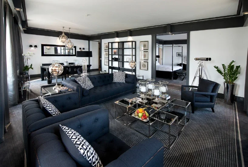 ALFRED BOREL SUITE - A signature lakeside suite offering sweeping views of Lake Neuchâtel and the Alps, with generous living spaces designed for refined comfort and privacy.