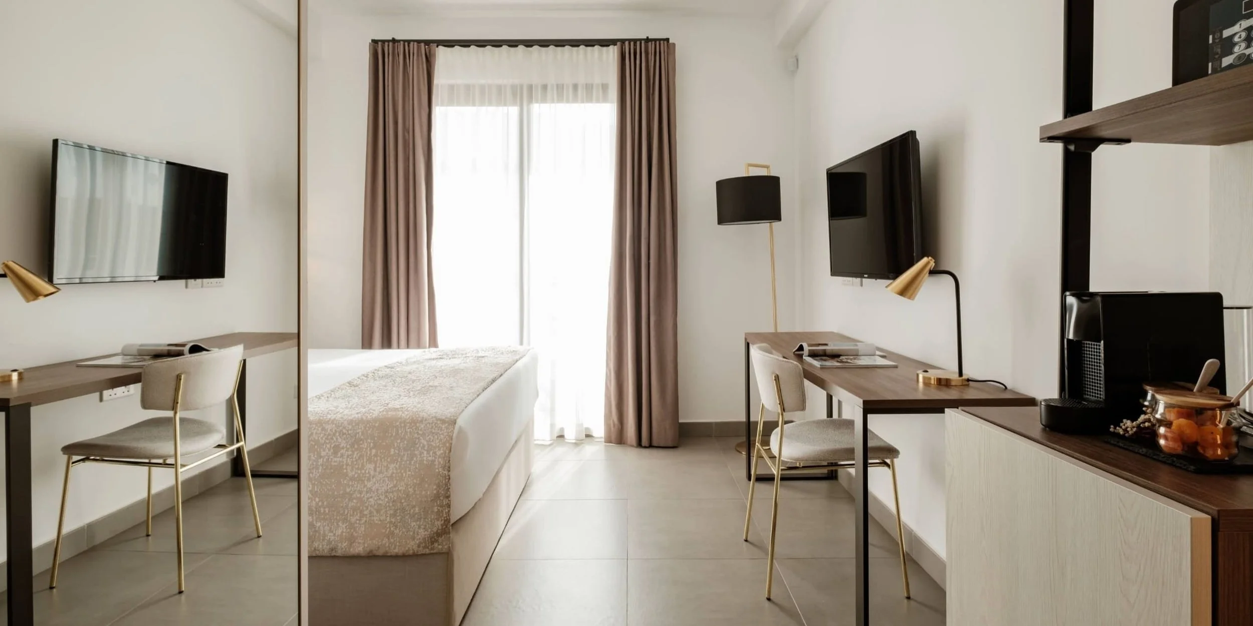 SUPERIOR ROOM - A refined room set on the higher floors, offering a private balcony and a serene atmosphere with elevated views.