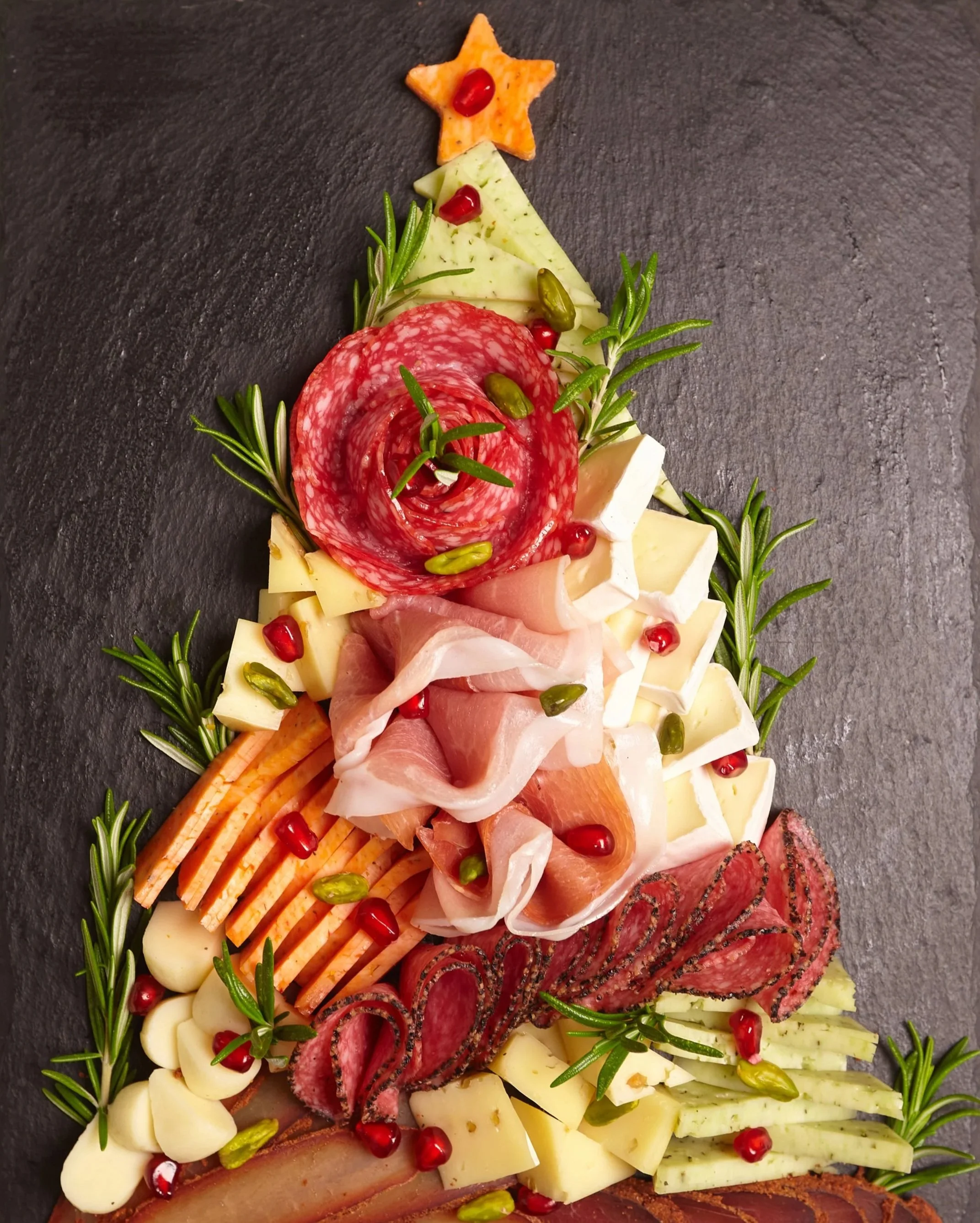 Holiday charcuterie catering, grazing tables, and charcuterie cups for delivery in Metro Detroit.