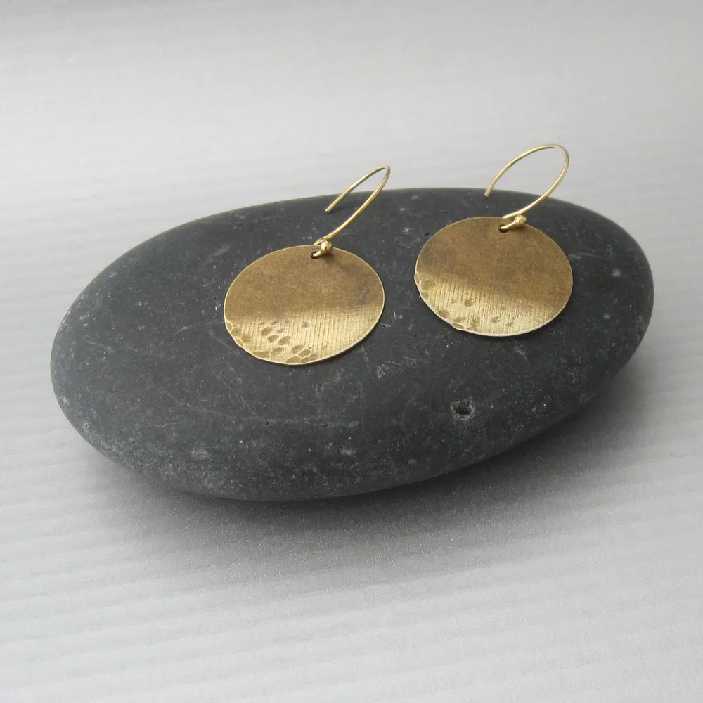 saturno-earrings.webp