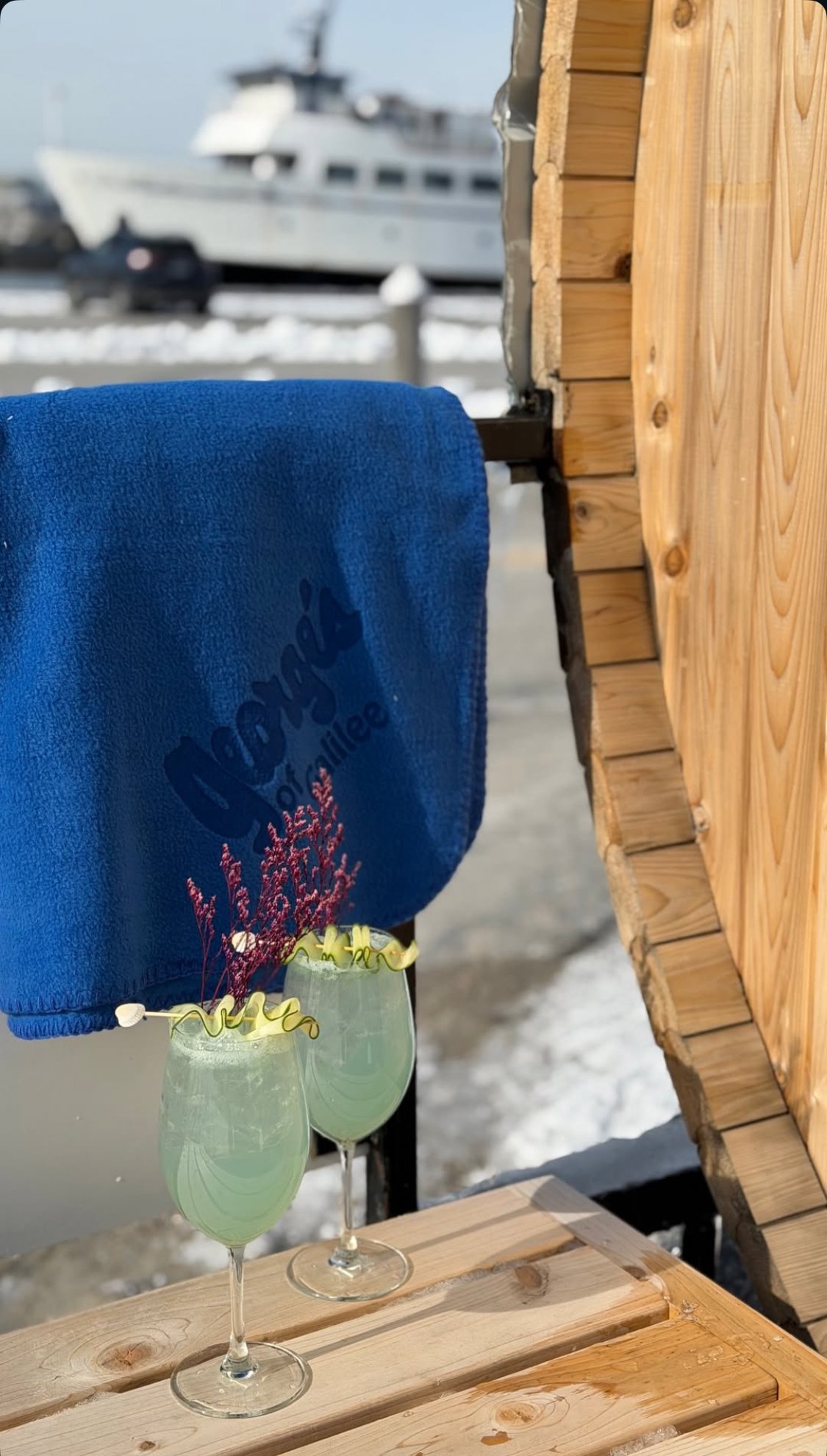 Mobile sauna with cocktails and mocktails event with oceanfront plunge in Narragansett, RI. Valentine's weekend getaway in RI