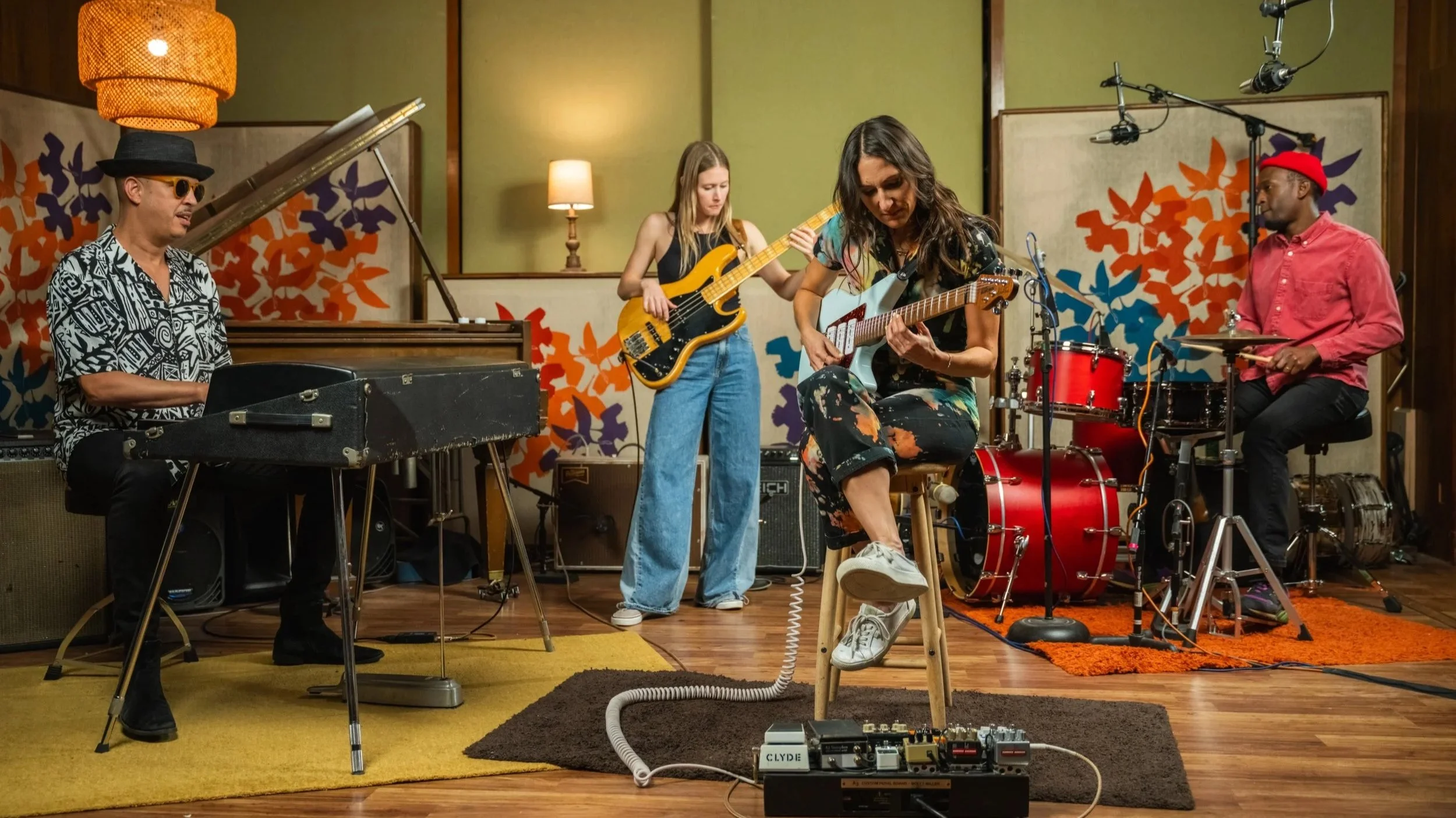 Guitarist & musician, Molly Miller, playing in a band with keys, drums and bass. This is an indoor session with all musicians jamming as part of Pickup Music's live backing band feature.