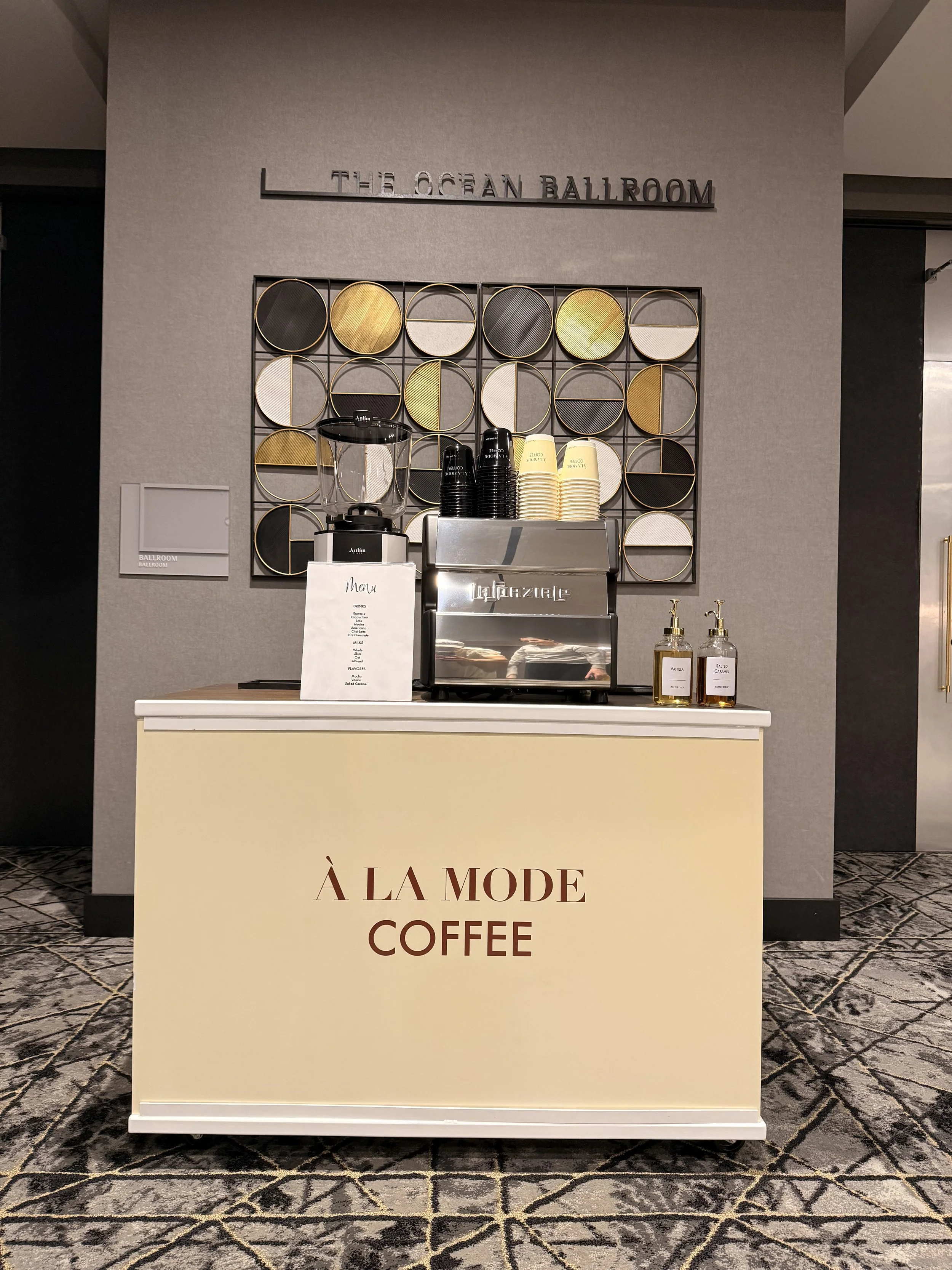 Mobile coffee cart by À La Mode Coffee providing full-service espresso catering at a special event in Orlando, Florida.