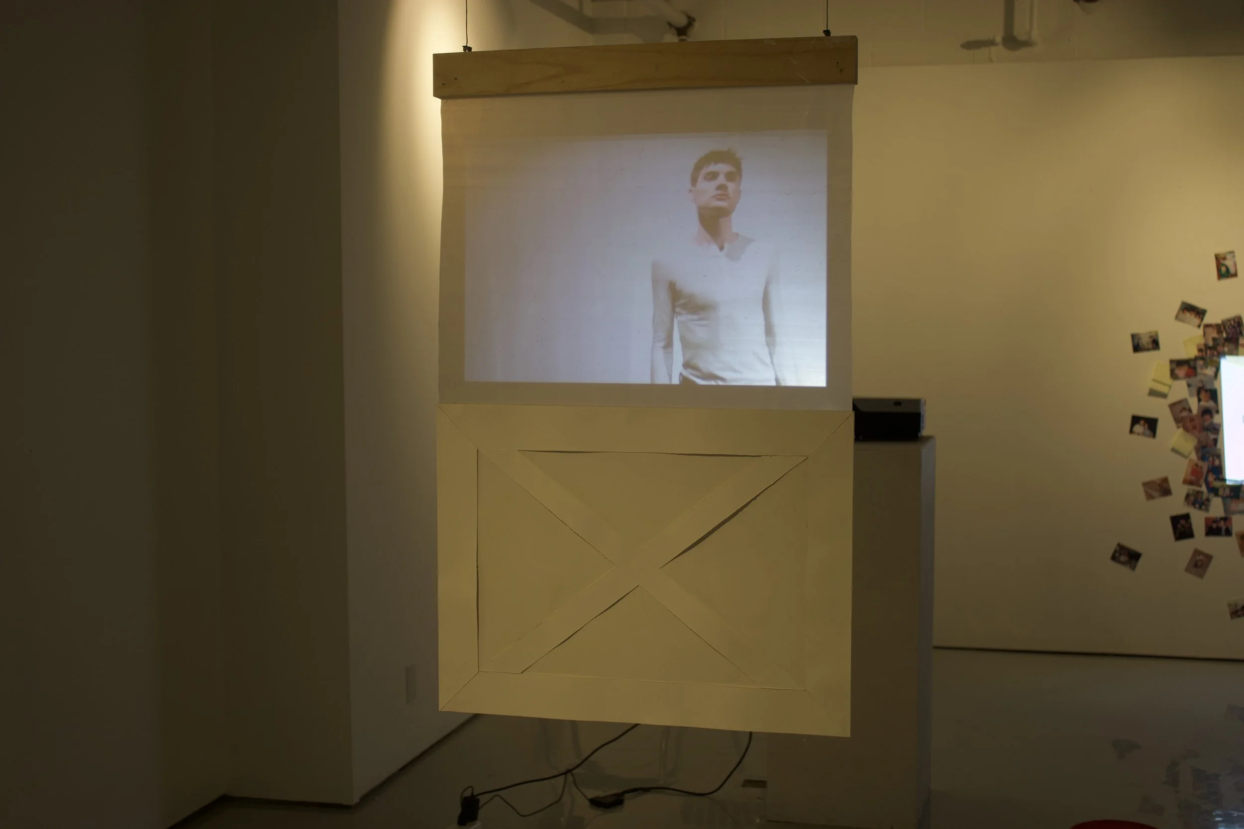 Upper/lower, Recorded video, painted board, plastic sheet, 18 x 36 in. Runtime: 1:16. 2025