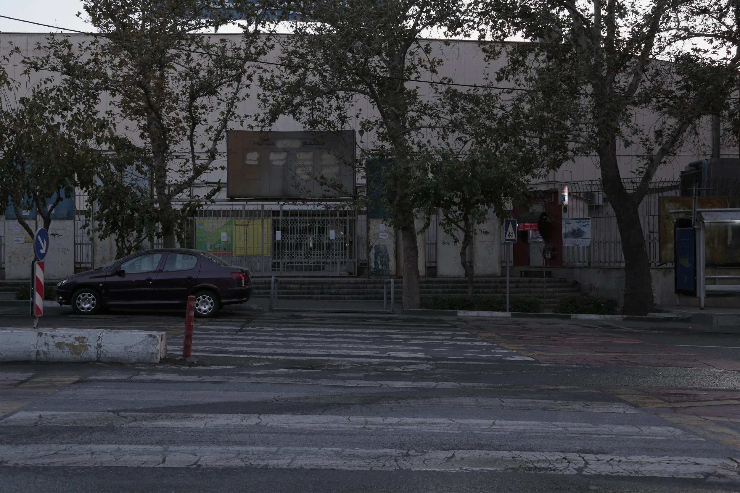 Hejab Street, Tehran, 12:00 p.m., a Sunday in Khordad: The body of a friend was under blows.
