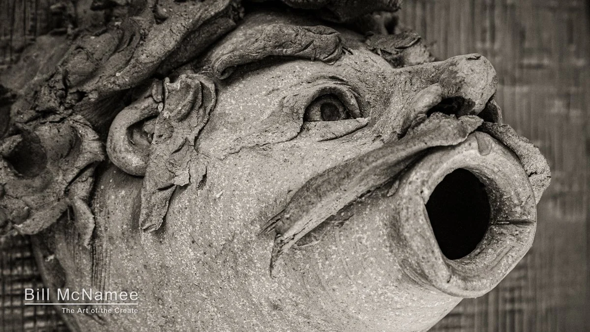 Nearscape Photography: Clay Faces on the Barn