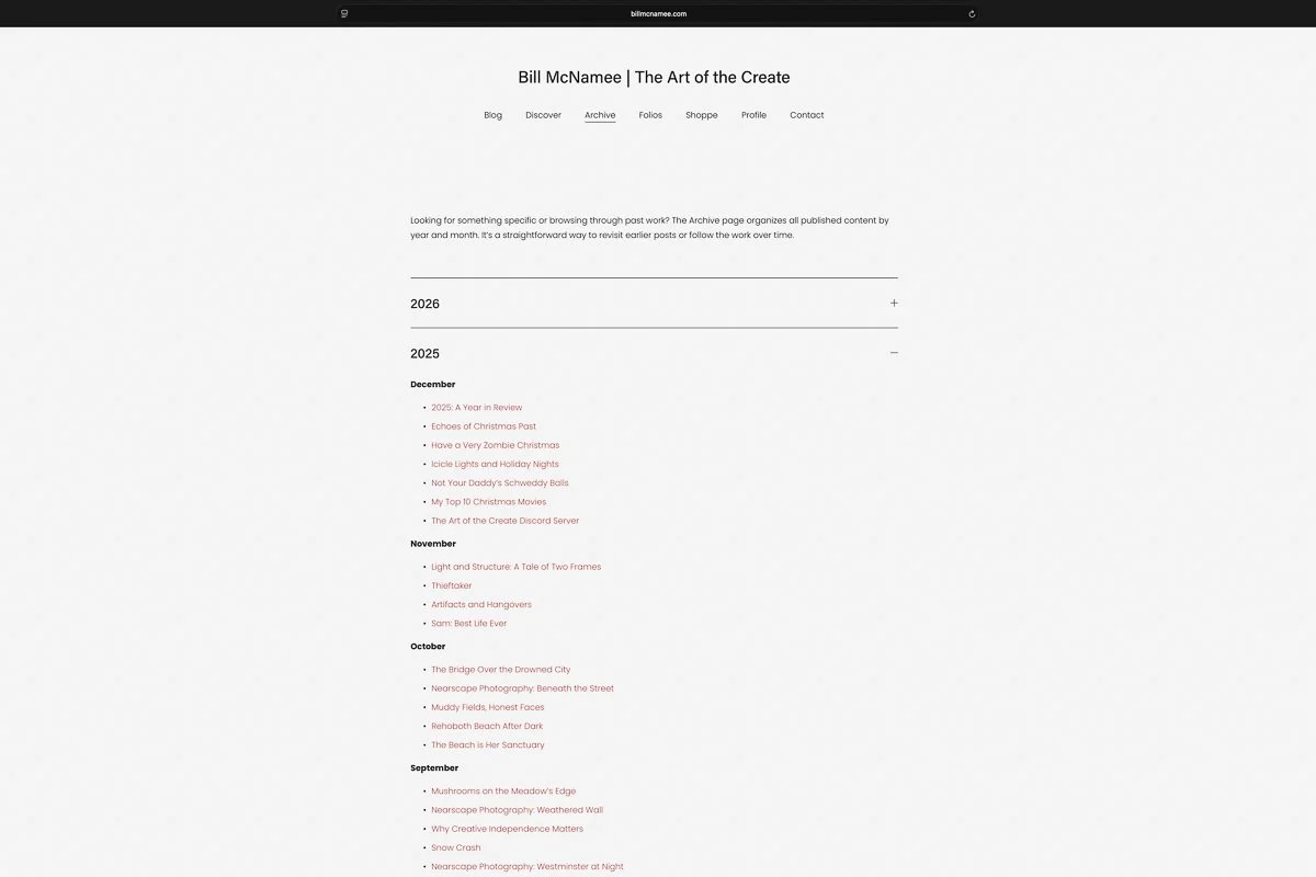 Archive page showing blog posts organized by year and month with expandable sections and post titles