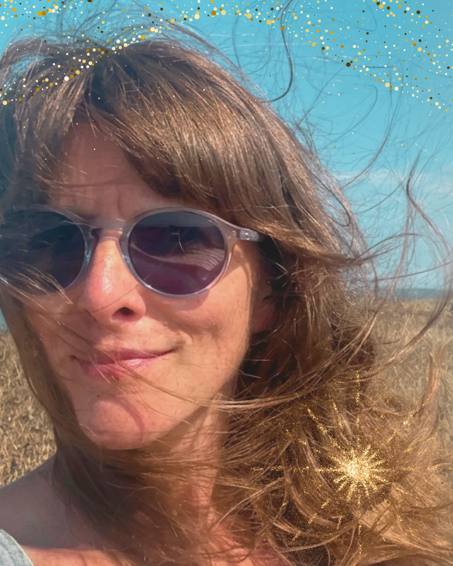 Freddy Johnston, coach and medical qigong practitioner wearing shades at the beach