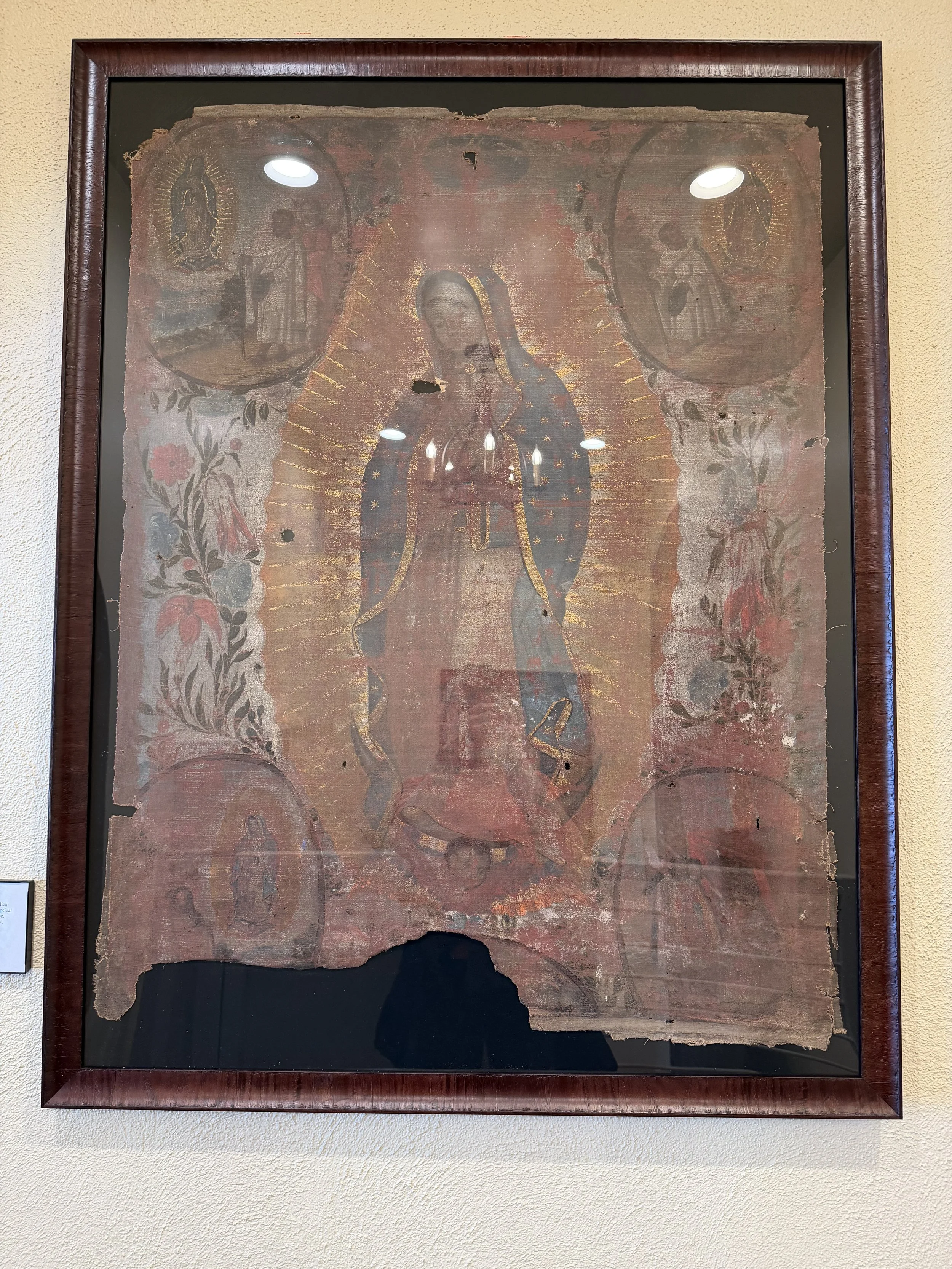 Our Lady of Guadalupe painted with gold.