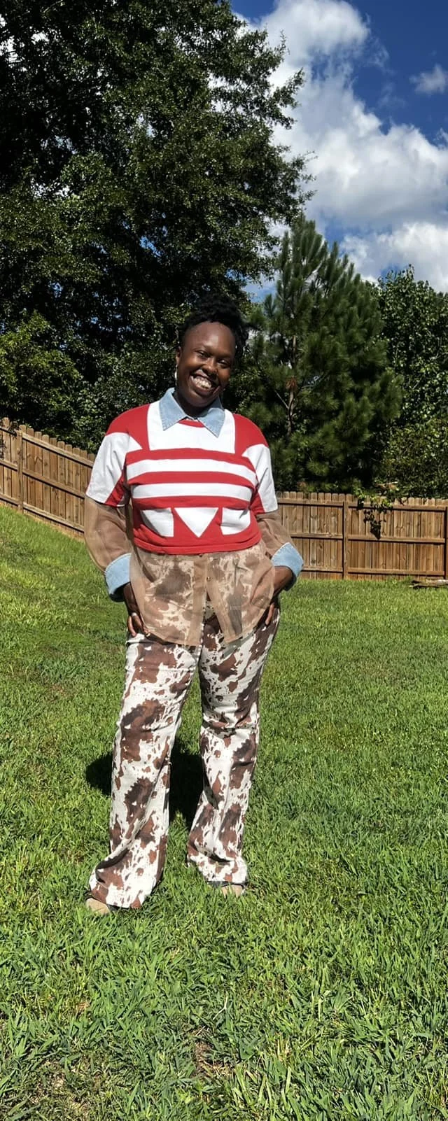 Customer styled in trendy Seabreeze Kloset boutique fashion and statement accessories.