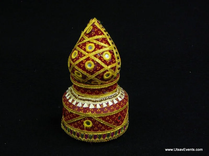 Fabric wraped coconut on stand.JPG