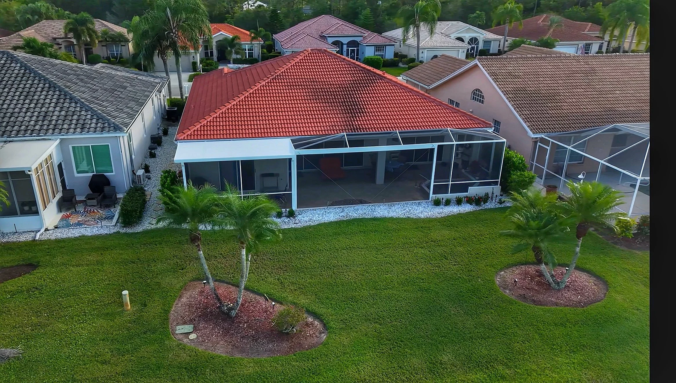 Aerial Pool Enclosure – Herons Glen

A bird’s-eye view of this custom pool enclosure in the Herons Glen community of North Fort Myers. Built with durable aluminum framing and composite roof panels, the design complements the home’s tile roof while ma