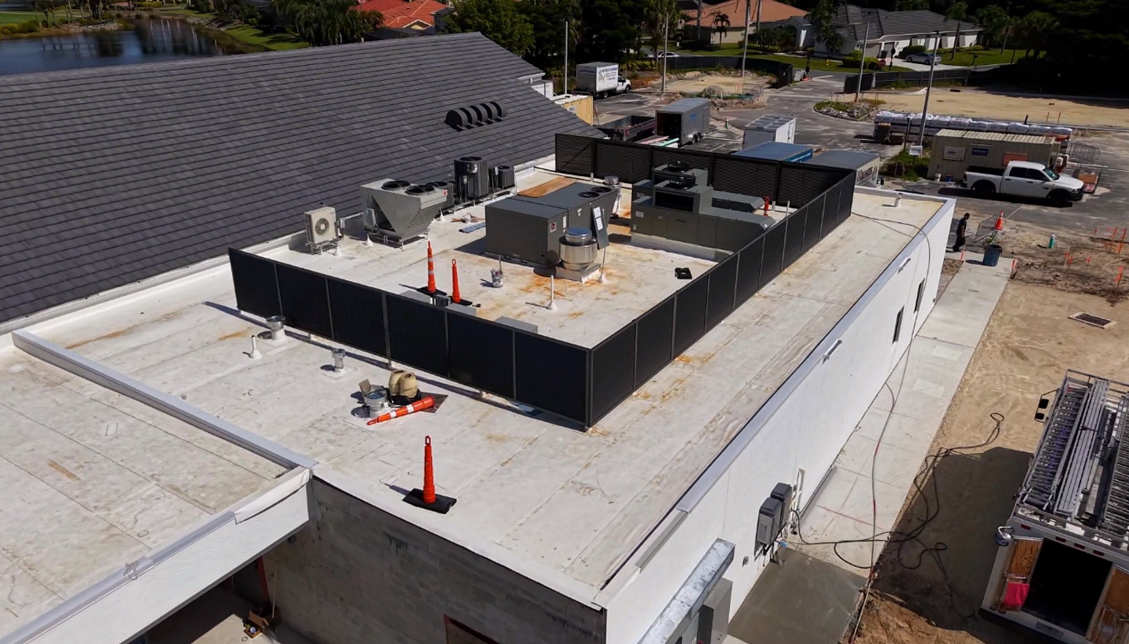 Rooftop Privacy Panels – Heritage Palms, Fort Myers

At The Lodge, Heritage Palms Country Club, our team at Turn Key Home Services engineered a high-performance rooftop privacy enclosure that both hides and protects mechanical systems. Built from cor