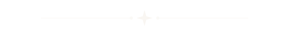 A white star with decorative lines on a black background.