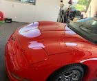 Red sports car parked outdoors