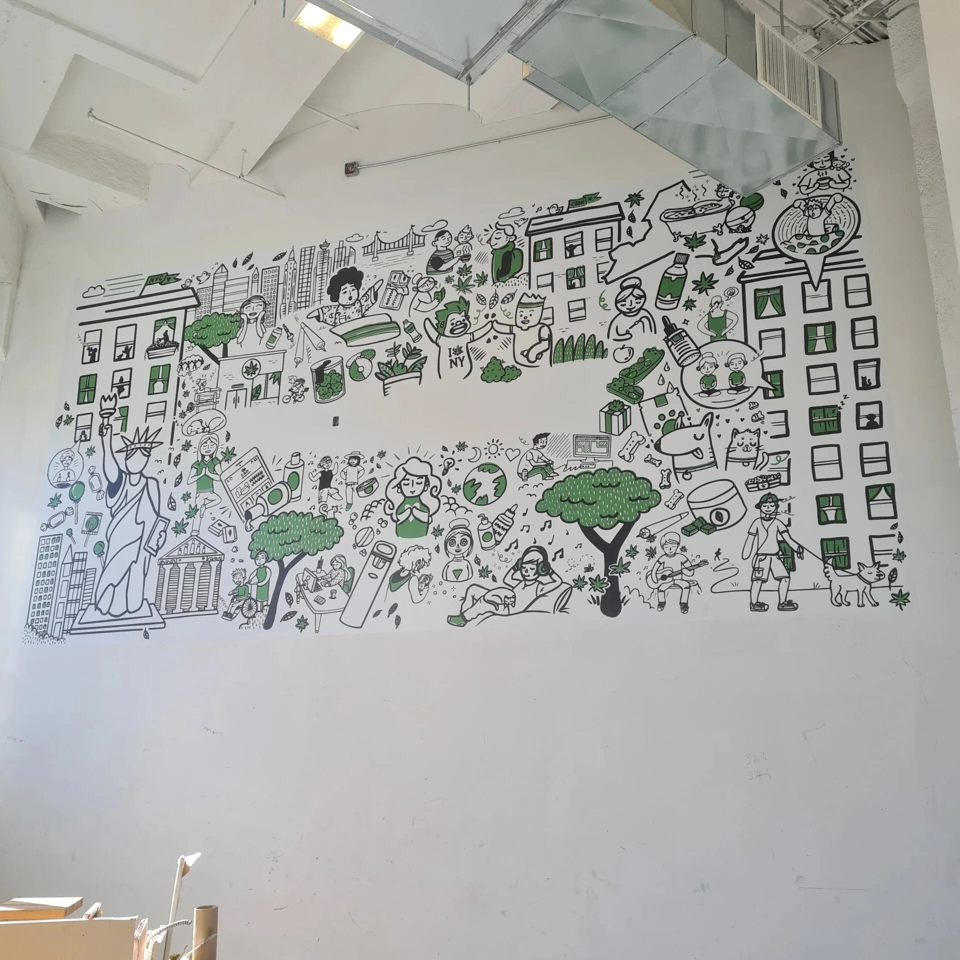 A large black and white wall mural depicting scenes of city life and outdoor activities, with illustrations of buildings, people, trees, and various hobbies, accented with green highlights.