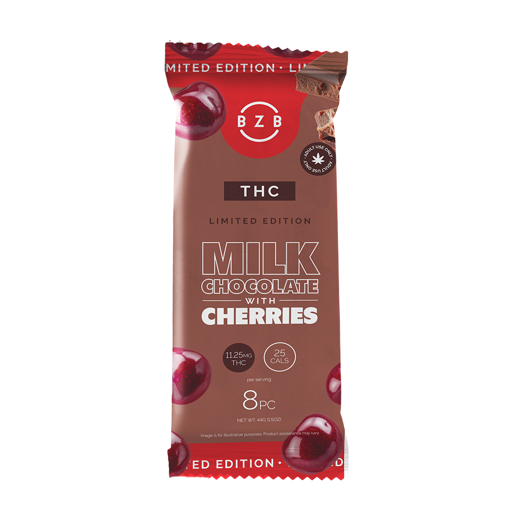 Chocolate bar packaging labeled Limited Edition Milk Chocolate with Cherries containing 8 pieces, 25 calories per serving, 11.25 mg THC, and 44 grams net weight.