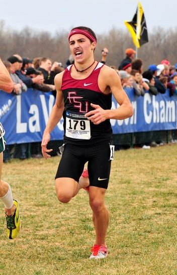 NCAA Division I Cross Country National Championships — FSU athlete pushing through the final stretch with strength and determination