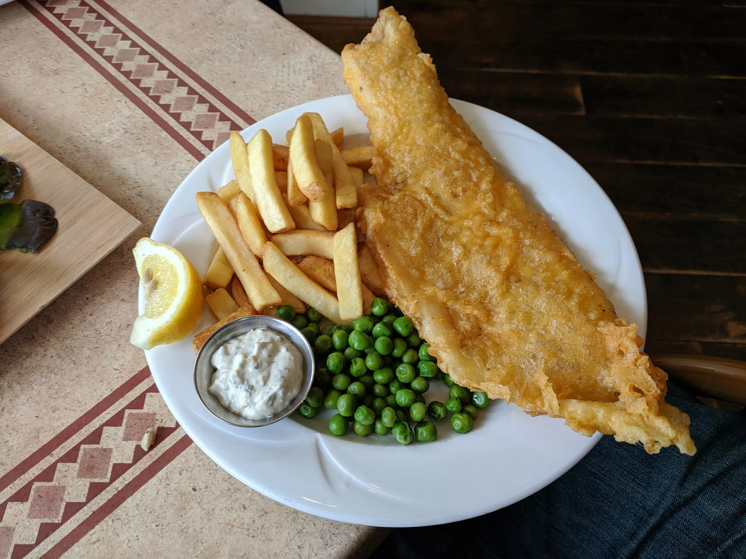 Fish and chips plate with peas