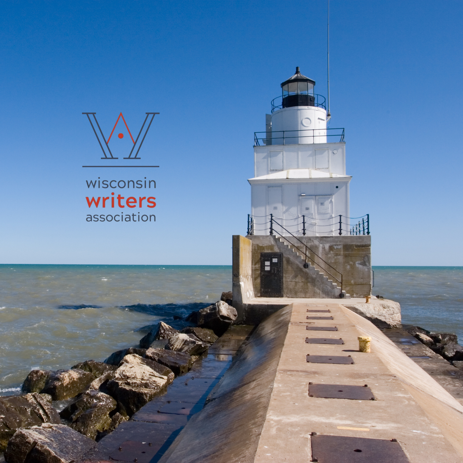 Manitowoc WI harbor lighthouse on Lake Michigan with Wisconsin Writers Association logo