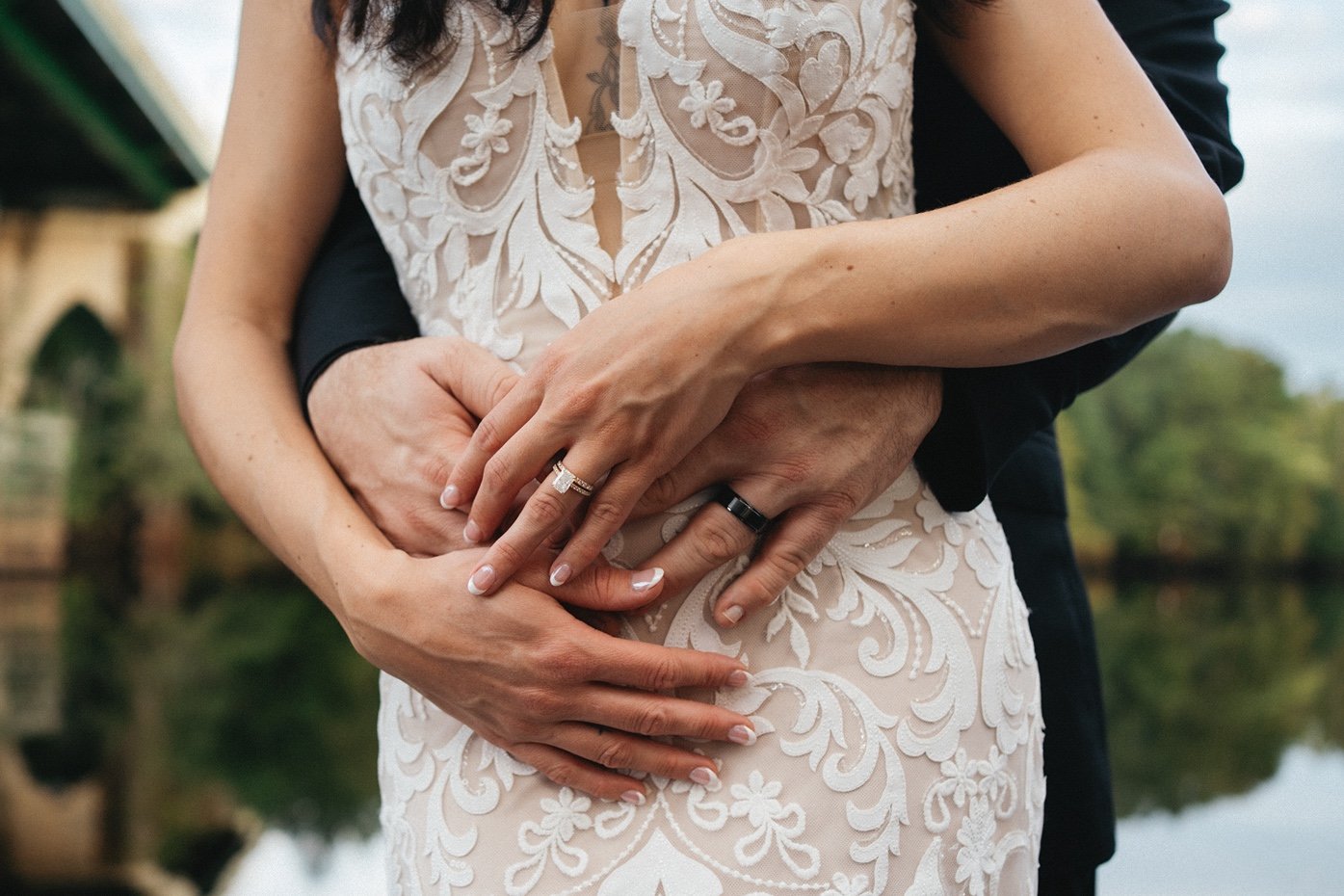peanut-warehouse-conway-sc-wedding-hands-wearing-wedding-rings-carly thompson photography.jpg
