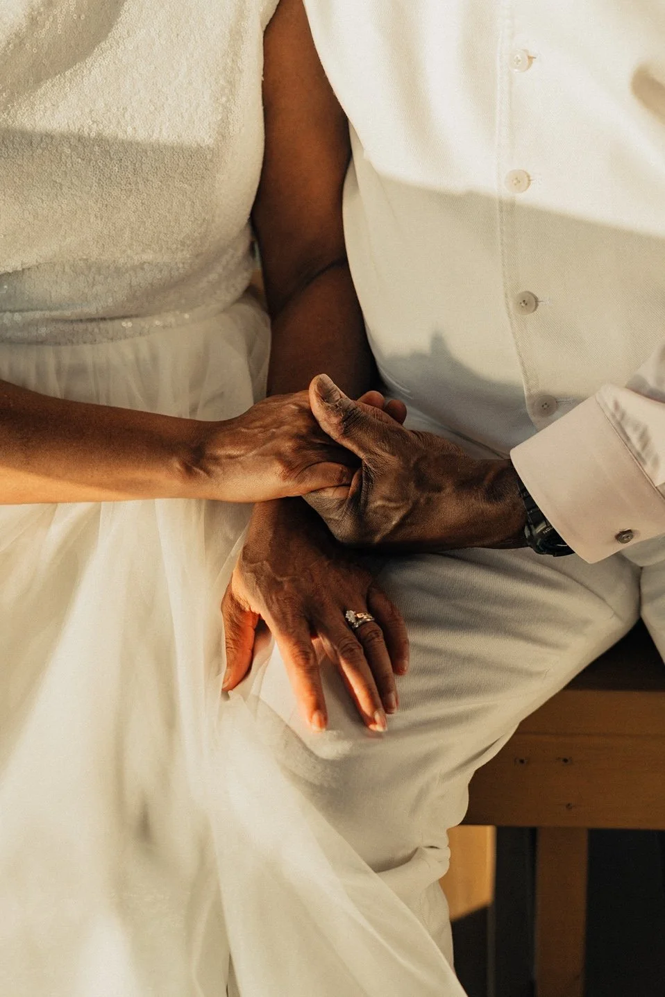 myrtle-beach-wedding-holding-hands-wedding-rings-carly thompson photography.jpg