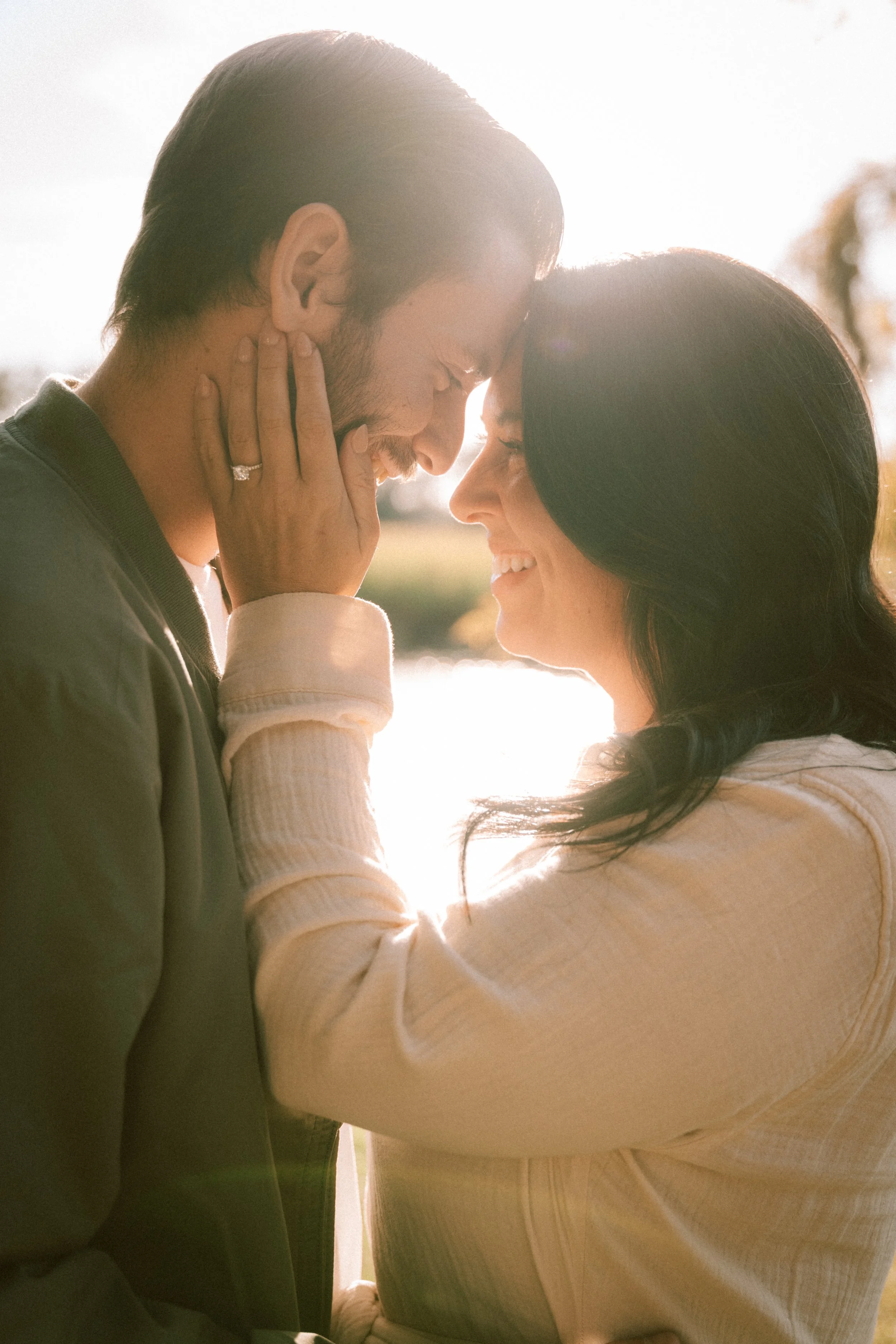myrtle-beach-caledonia-golf-fish-club-engagement-golden-hour-couple-kissing-carly thompson photography.jpg