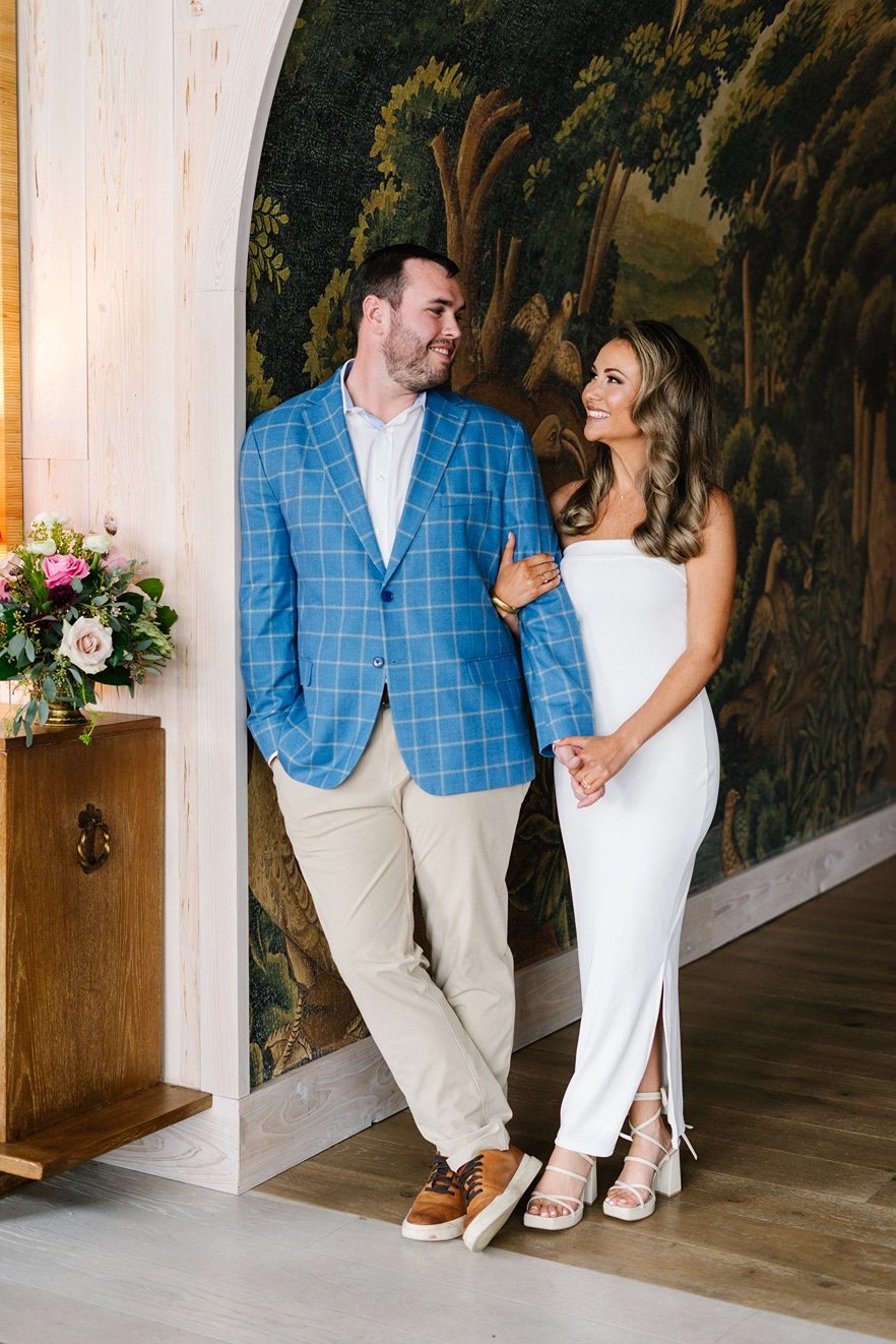 the-george-hotel-georgetown-sc-wedding-couple-posing-in-lobby-carly thompson photography.jpg