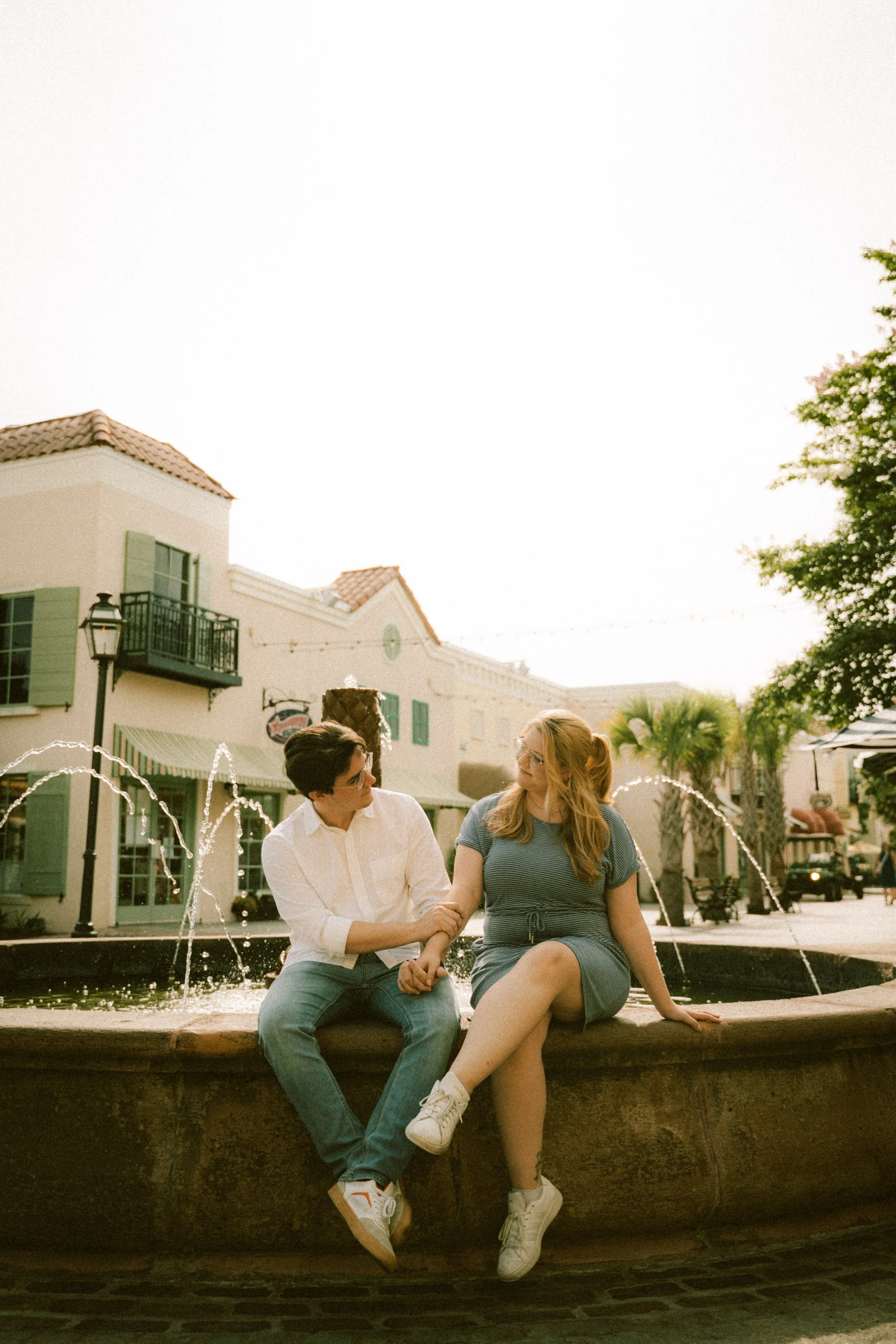 broadway-at-the-beach-myrtle-fountain-couple-engagement-carly thompson photography.jpg