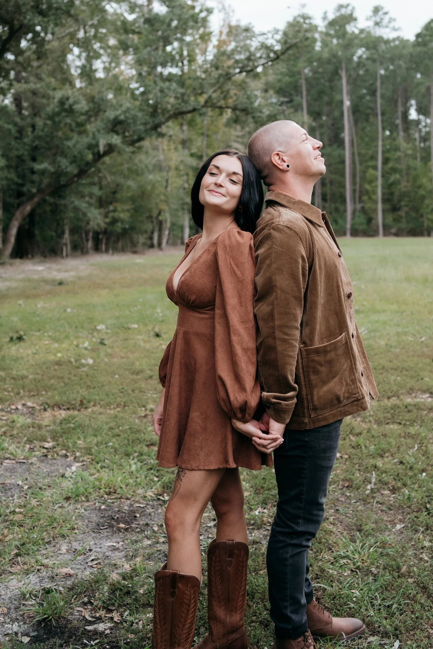 conway-south-carolina-engagement-fall-couple-holding-hands-field-carly thompson photography.jpg