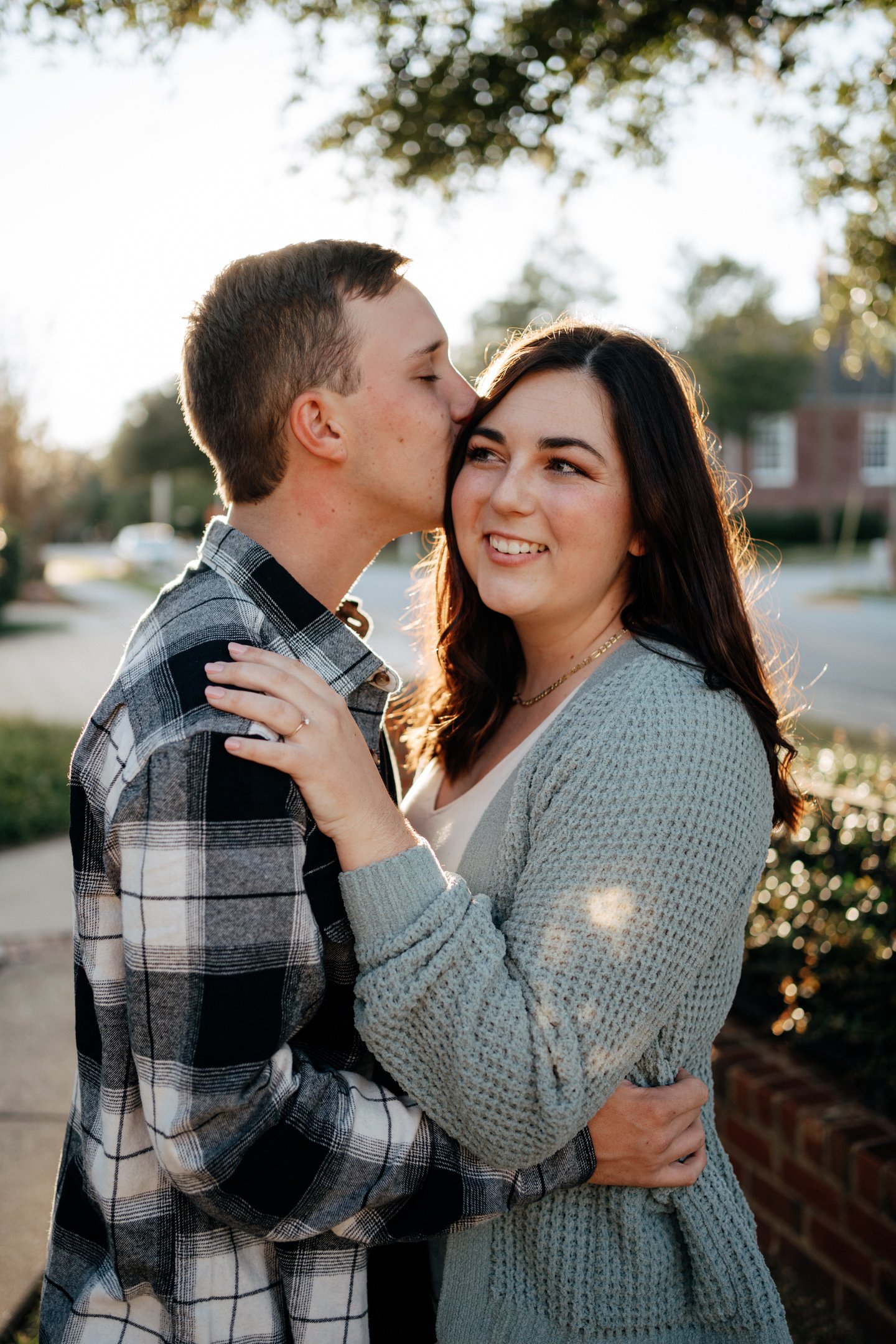 conway-south-carolina-engagement-couple-golden-hour-kissing-carly thompson photography.jpg