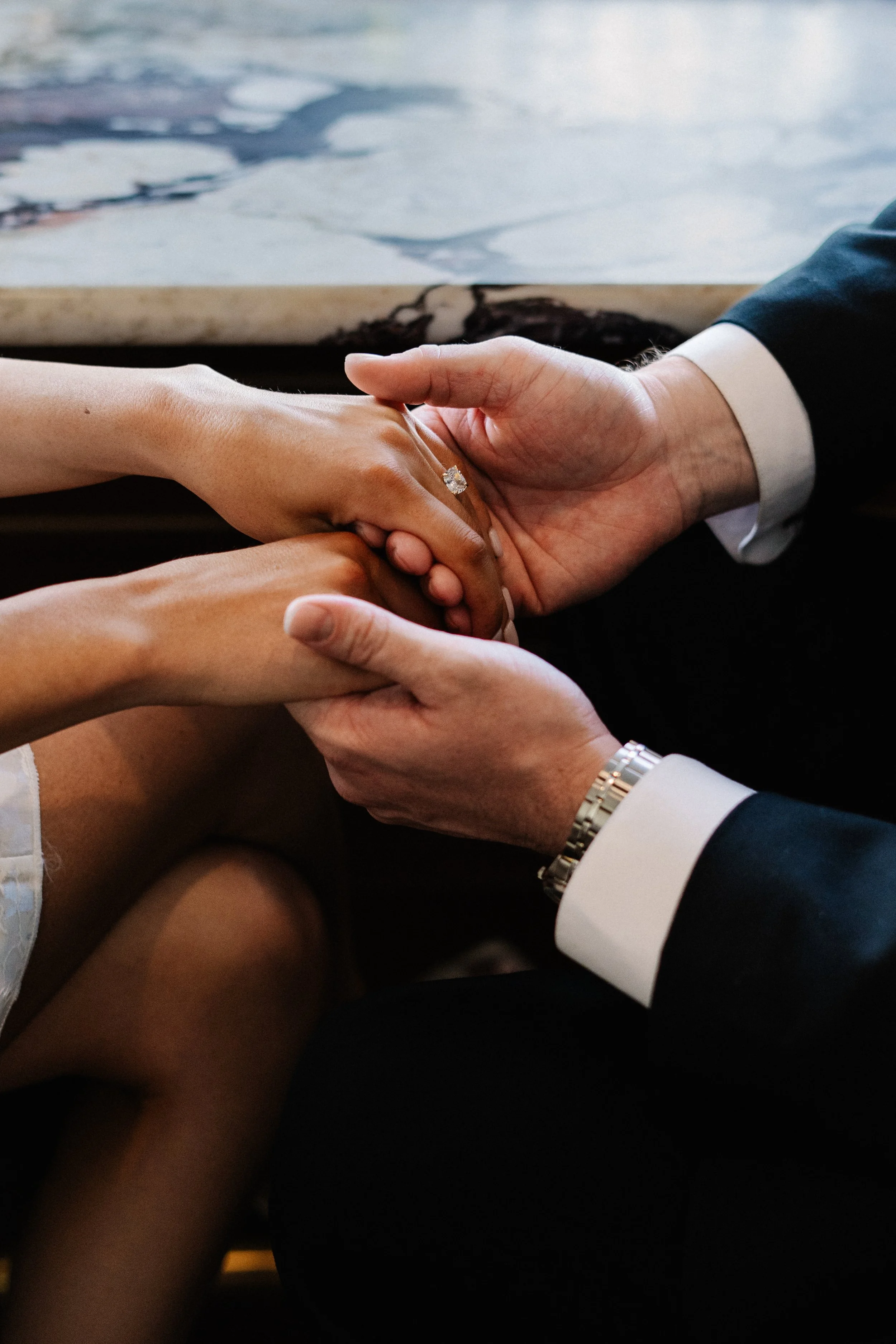 the-george-hotel-georgetown-sc-engagement-bar-holding-hands-carly thompson photography.jpg