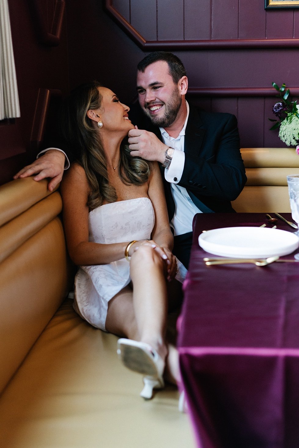 the-george-hotel-georgetown-sc-wedding-couple-sitting-at-table-reception.jpg