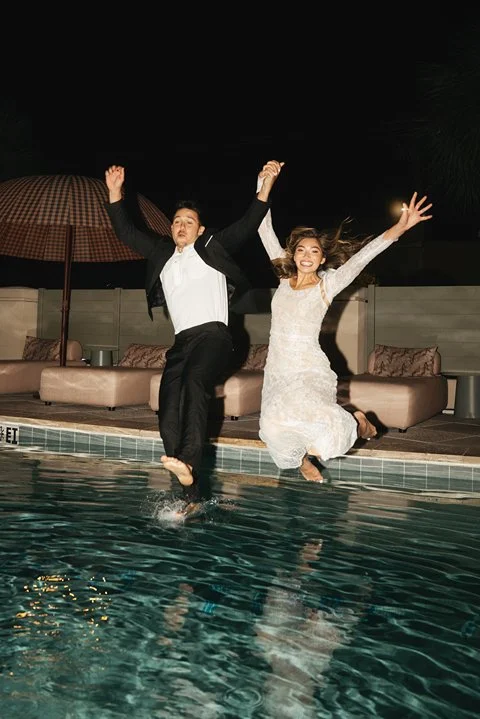 charleston-ryder-hotel-wedding-couple jumping-into-pool-carly thompson photography.jpg